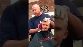 Barber pretends to cut off boy's ear