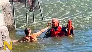 Suspect flees into Central Park lake during arrest!